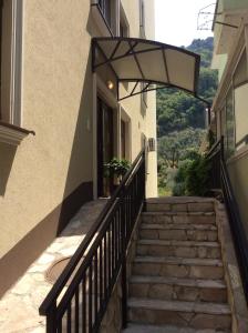 a set of stairs leading up to a building at Olive Terrace Apartments 3 in Budva