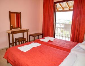 Postel nebo postele na pokoji v ubytování Hotel Olga