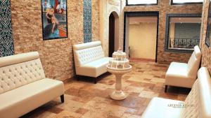 Posezení v ubytování Artemis Resort Wellness Hotel