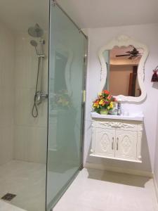 a bathroom with a shower and a mirror at Luang Prabang Golden Lotus Villa River View in Luang Prabang +55 photos
