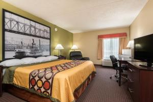Postel nebo postele na pokoji v ubytování Super 8 by Wyndham Miamisburg Dayton S Area OH + 22 fotografií