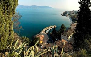 a view of a bridge over a large body of water at Casa Gaino in Toscolano Maderno