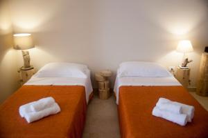 Postel nebo postele na pokoji v ubytování 3 Archi B&B