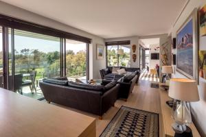 Posezení v ubytování Holiday Rentals at Camiral Golf & Wellness