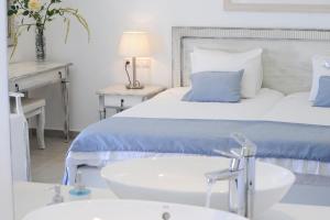 Cama ou camas em um quarto em Hotel Anna