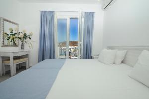 Cama ou camas em um quarto em Hotel Anna