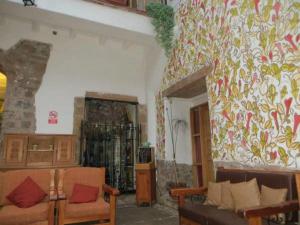 Uma área de estar em Posada Villa Mayor