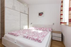 Postel nebo postele na pokoji v ubytování Villa Janja