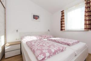 Postel nebo postele na pokoji v ubytování Villa Janja