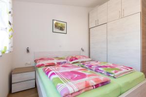 Postel nebo postele na pokoji v ubytování Villa Janja