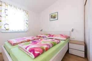 Postel nebo postele na pokoji v ubytování Villa Janja