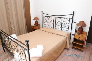 Letto o letti in una camera di B&B Villa Delle Rondini