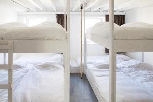 Säng eller sängar i ett rum på Villa Wellington