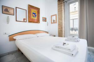 Cama o camas de una habitación en Living Valencia - Jardín del Turia