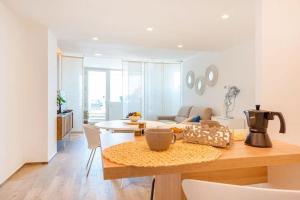 a kitchen and living room with a coffee pot on a table at Dimora Silcla1 in Polignano a Mare