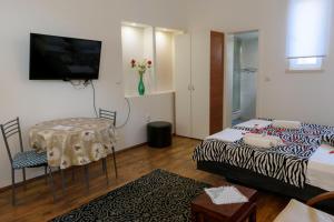 Кровать или кровати в номере Villa Astra