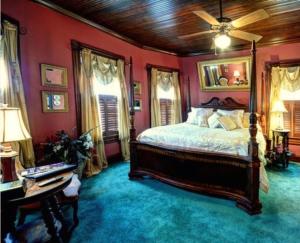 a bedroom with a bed and a ceiling fan at Thomasville Bed and Breakfast in Thomasville +7 photos