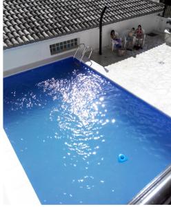 Poolen vid eller i närheten av Casa Rural El Abuelo Luis