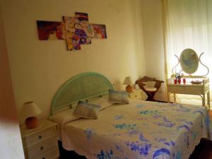 En eller flere senger på et rom på Maisonette Asfodelo