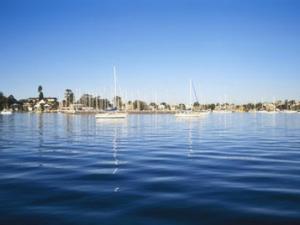 a large body of water with boats in it at Aquarius Motel in Belmont