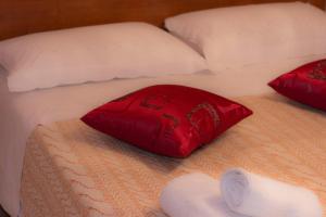 A bed or beds in a room at Casa Vacanze Etna