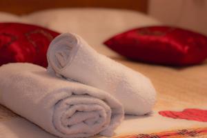 A bed or beds in a room at Casa Vacanze Etna