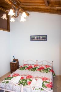 A bed or beds in a room at Casa Vacanze Etna