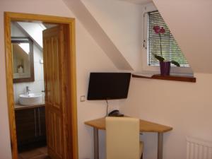 TV a/nebo společenská místnost v ubytování Guest House Čater