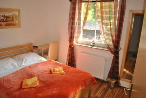 Postel nebo postele na pokoji v ubytování Guest House Čater