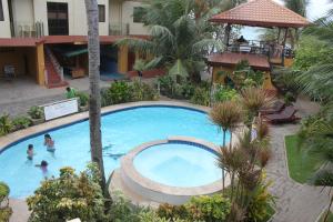 an overhead view of a swimming pool at a hotel at Lost Horizon Beach Dive Resort in Panglao Island