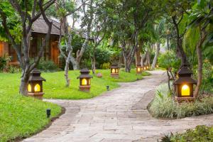 A garden outside The Hotel @ Tharabar Gate