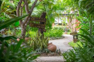 A garden outside The Hotel @ Tharabar Gate