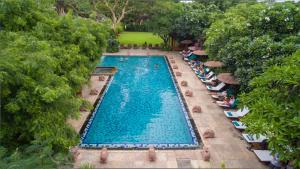 The swimming pool at or close to The Hotel @ Tharabar Gate