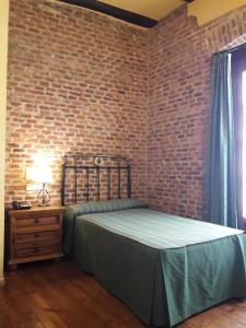 Postel nebo postele na pokoji v ubytování Hotel La Posada Regia