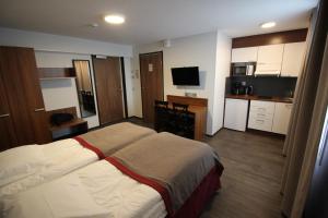 Postel nebo postele na pokoji v ubytování Motel SEO Muonio + 12 fotografií