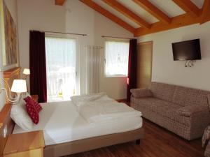 Postel nebo postele na pokoji v ubytování Sole Levante