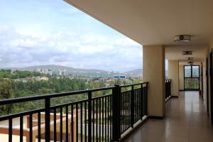 A balcony or terrace at Dmall Hotel