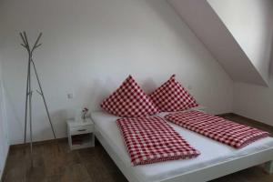 Кровать или кровати в номере FeWo Daiber