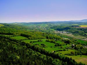 an aerial view of a valley with green fields and trees at "Haus Saskia" in Wutha-Farnroda