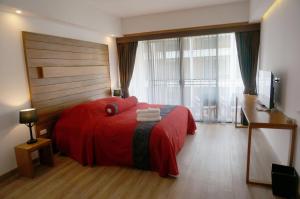 Postel nebo postele na pokoji v ubytování SugarCane Chiang Mai
