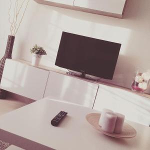 TV a/nebo společenská místnost v ubytování Costa Reinante Spa