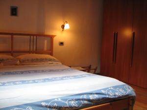Posteľ alebo postele v izbe v ubytovaní B&B Vecchio Torchio di Bard