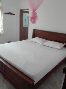 Postel nebo postele na pokoji v ubytování Guesthouse Kind and Love