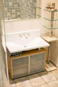 Ένα μπάνιο στο Apartment Blaumana 6 +16 φωτογραφίες