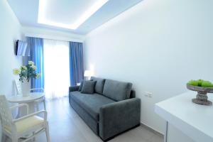 Uma área de estar em Hotel Anna