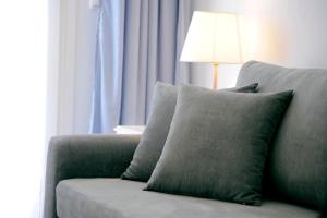 Uma área de estar em Hotel Anna