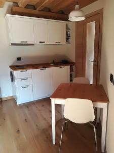 Kuchyň nebo kuchyňský kout v ubytování Ai Ruc