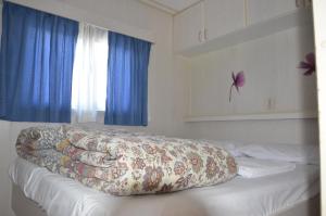 Voodi või voodid majutusasutuse Camping Adamello toas