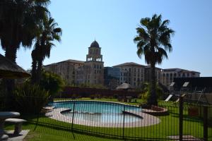 a view of the mgm hotel from the courtyard at Alendo Apartments in Johannesburg