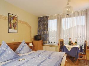 Postel nebo postele na pokoji v ubytování Haus zur Sonne Sauerland